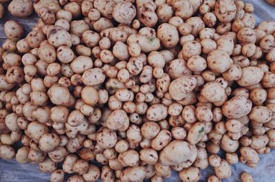 Full frame shot of onions for sale in market