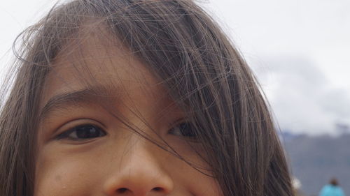 Close-up portrait of smiling girl 