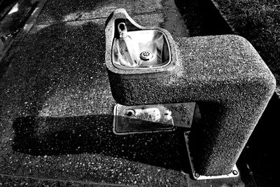 Close-up of shoes on tiled floor