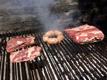 Close-up of meat on barbecue grill
