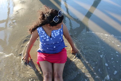 High angle view of girl in water