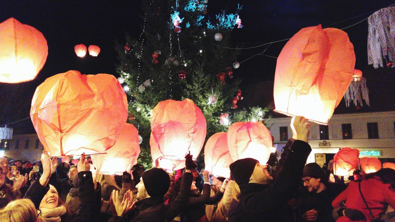 illuminated, night, celebration, large group of people, lighting equipment, men, lantern, decoration, lifestyles, tradition, leisure activity, togetherness, enjoyment, traditional festival, person, cultures, indoors, arts culture and entertainment, crowd