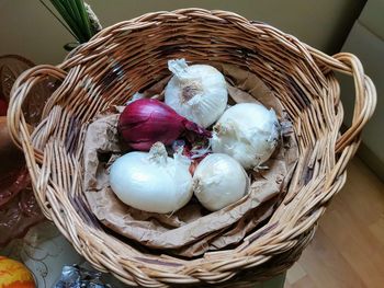 High angle view of eggs in basket on table