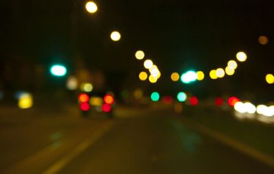 High angle view of illuminated road at night