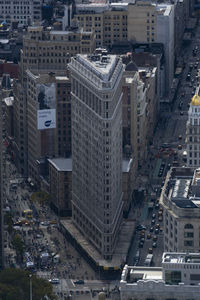 High angle view of street amidst buildings in city