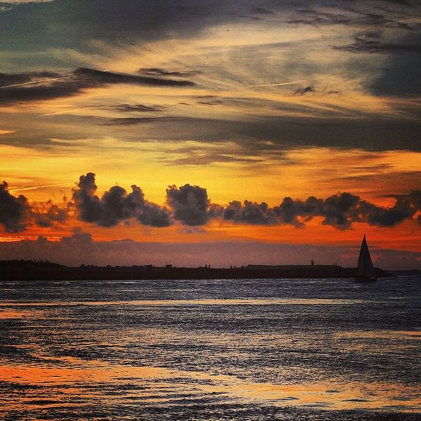 sunset, water, orange color, scenics, sea, beauty in nature, tranquil scene, sky, tranquility, beach, idyllic, nature, cloud - sky, silhouette, shore, dramatic sky, waterfront, wave, outdoors, horizon over water