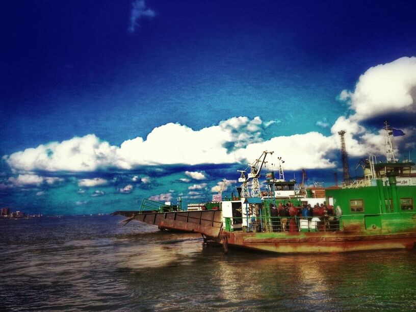 sky, water, sea, cloud - sky, waterfront, cloudy, blue, built structure, cloud, nature, architecture, horizon over water, scenics, building exterior, tranquility, tranquil scene, beauty in nature, pier, day, beach