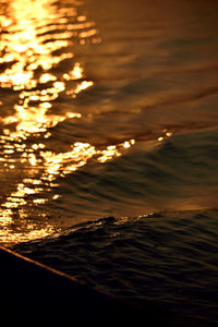 Aerial view of sea against sky during sunset