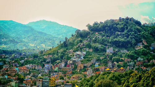 Scenic view of cityscape against sky