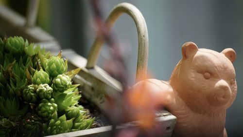 Image detail of a patio decoration with a happiness bear