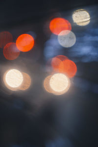 Defocused image of illuminated lights at night