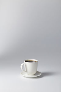 Coffee cup against white background