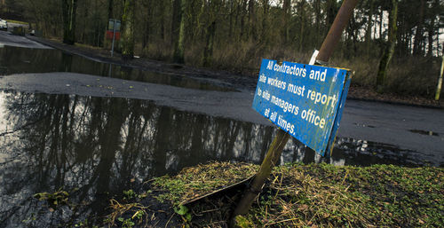 Information sign on tree trunk