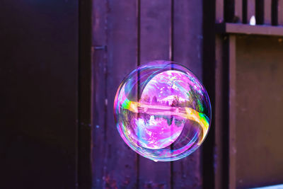 Close-up of bubbles against glass wall