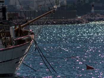 Man on boat sailing in sea