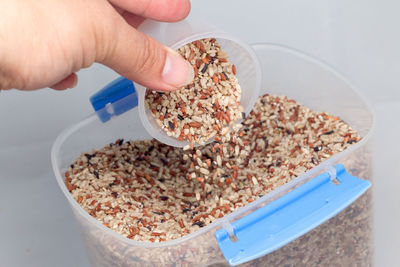 Cropped image of person holding food