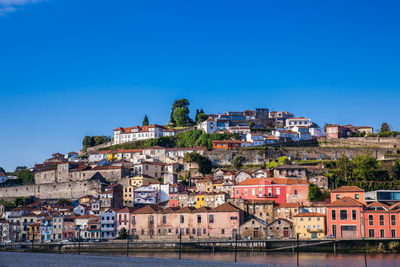 Vila nova de gaia on the banks of douro river seen from porto city