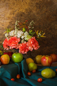 High angle view of multi colored fruits and flowers