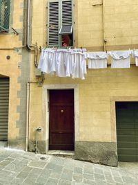 Clothes drying outside building