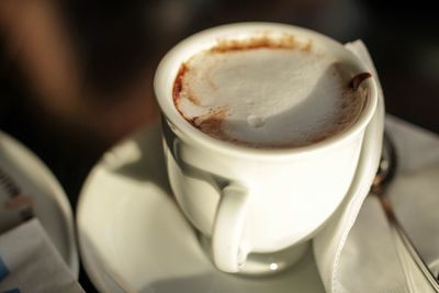 Close-up of cappuccino on table