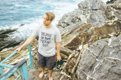 Full length of woman standing on shore