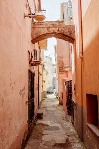 Narrow alley amidst buildings