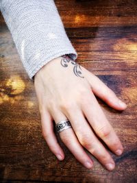 Close-up of woman hand with tattoo