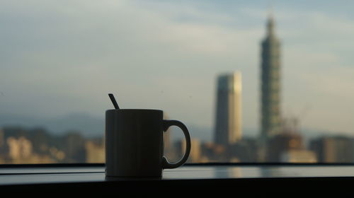 Close-up of coffee on table against sky