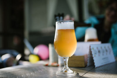 Close-up of beer in glass on table