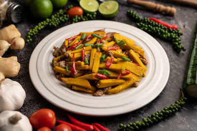 High angle view of vegetables in plate on table