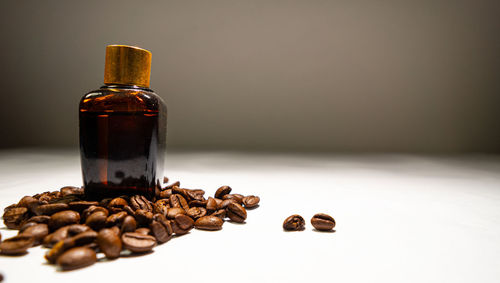 Close-up of coffee beans on table