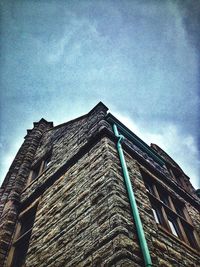 Low angle view of built structure against blue sky