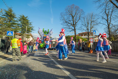 Rear view of man standing on road