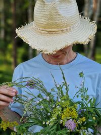 Woman with field flowers