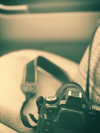 Close-up of camera on table