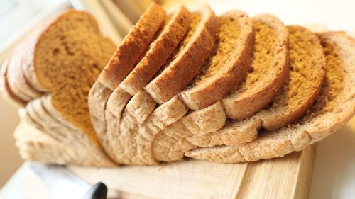 High angle view of bread on cutting board