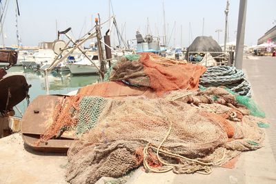 Fishing net on pier at harbor