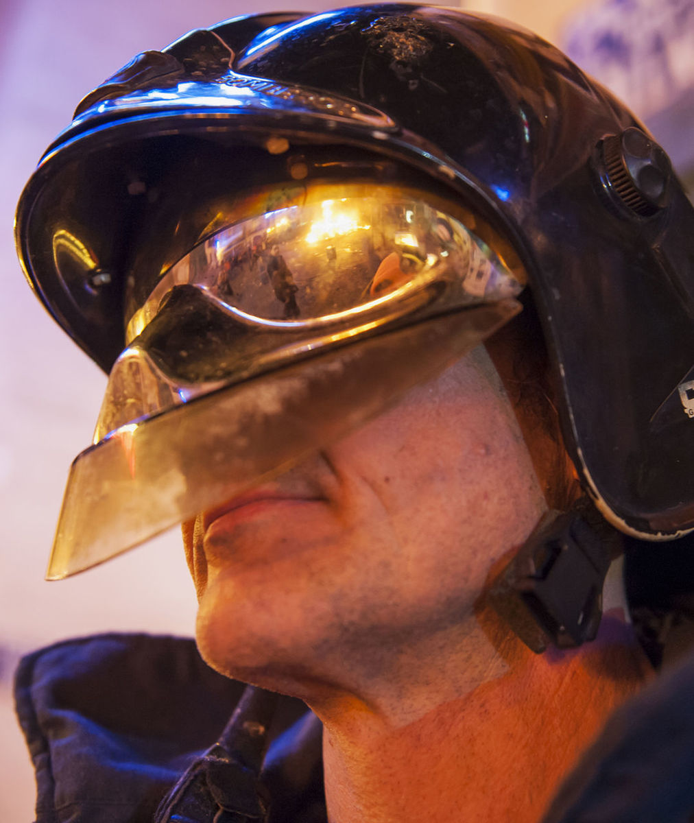 Close-up of man wearing helmet