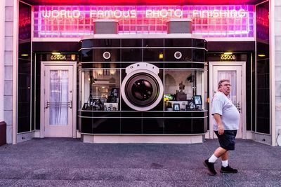 Full length of man standing on display