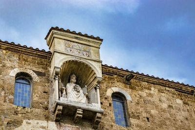 Low angle view of historical building against sky