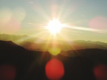 Close-up of sun against sky during sunset