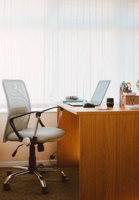 Empty chairs and table at home