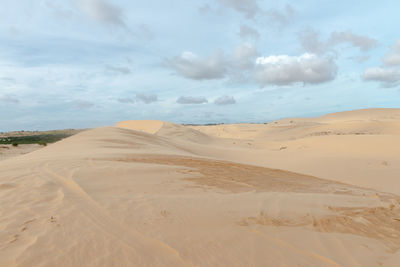 Scenic view of desert against sky