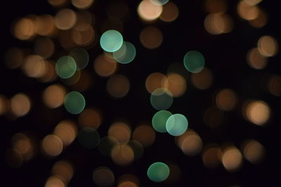 Defocused image of illuminated christmas tree