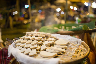 High angle view of street food for sale at market stall during night