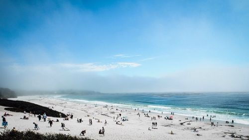 Scenic view of sea against blue sky