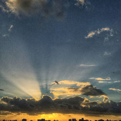 Low angle view of clouds in sky during sunset