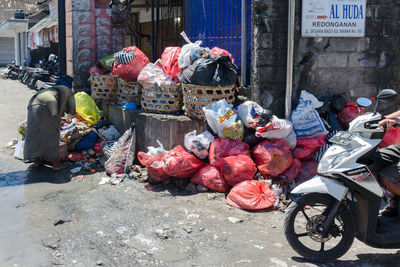 Garbage on street in city