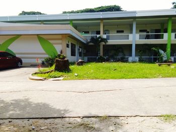 Footpath by street against building