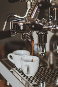 Close-up of coffee cup on table in cafe